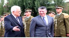 Palestinian President Mahmoud Abbas and King Abdullah of Jordan walk together during a welcoming ceremony in the West Bank city of Ramallah November 21, 2011. Abdullah arrived in Ramallah on Monday for a rare visit to the Israeli-occupied West Bank, as the Palestinians pursue statehood in a region riveted by the slide towards civil war in Syria and mounting unrest in Egypt. Photo by Thaer Ganaim