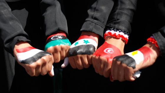 TOPSHOTS TOPSHOTS Yemenis women show off their fists paintd in the colours of five Arab national flags from left to right:- Yemen, Libya, Syria, Tunisia, and Egypt as they protest following friday noon prayers against Yemen's President Ali Abdullah Saleh in Sanaa, on October 28, 2011. AFP PHOTO/GAMAL NOMAN (Photo credit should read GAMAL NOMAN/AFP/Getty Images)